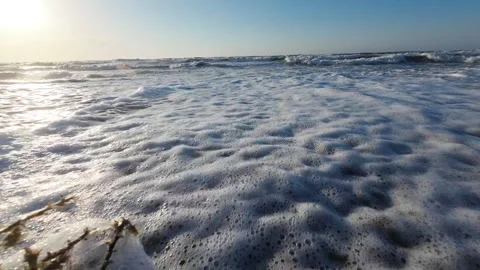 Sea waves approach the camera. Summertime slow motion shooting Stock Footage 276709634