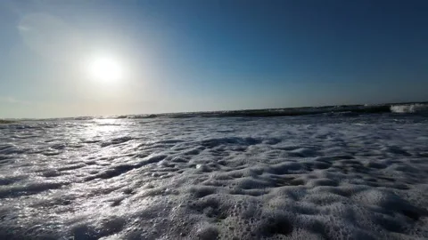 Sea waves approach the camera. Summertime slow motion shooting Stock Footage 276709921