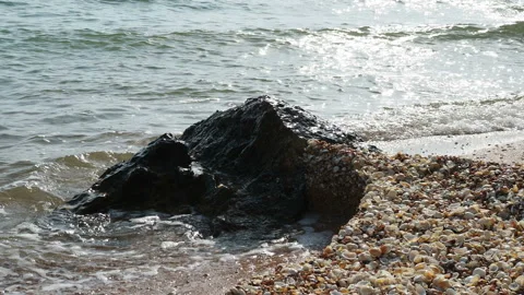 Sea waves are beating against the coastal cliffs. Easy excitement on the sea. Stock Footage 157478689