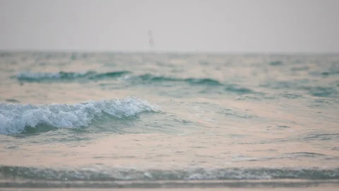 Sea waves are bubbles that hit the ground Stock Footage 102422220