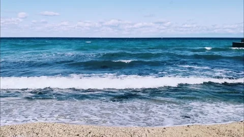 Sea waves are rushing onto the beach Stock Footage 189474197
