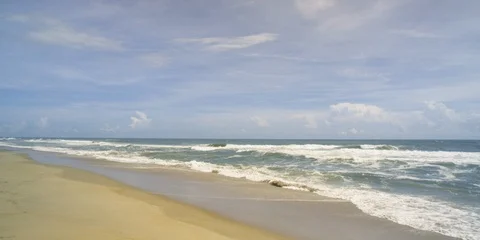 Sea waves back and forth on the calm beach Stock Footage 103493310