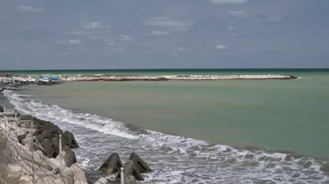 Sea Waves at the Beach Lighthouse 4K Stock Footage 66562293