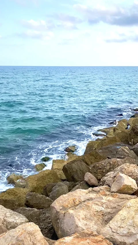 Sea waves beach rocks seascape Stock Footage 311057948