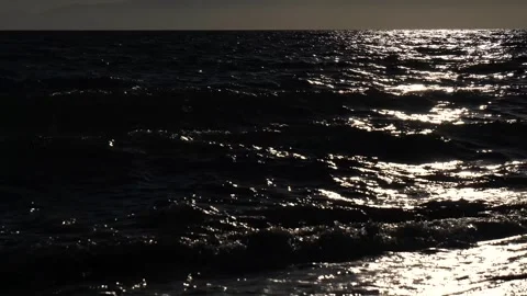 Sea ​​waves on the beach at sunset. 4k video footage Stock-Footage 291290167