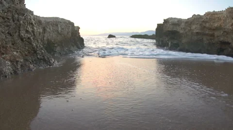 Sea waves on a beach at sunset Stock Footage 42408670