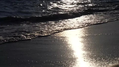 Sea ​​waves on the beach at sunset Stock Footage 291290640