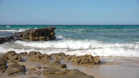 Sea waves beat against a stone Stock Footage 121653751
