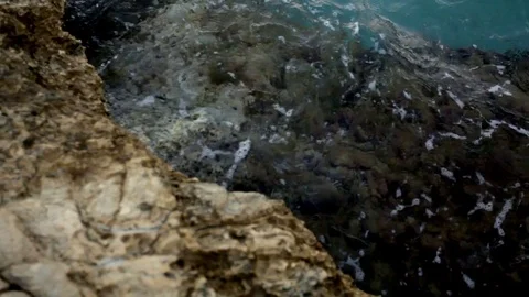 Sea waves beat on the stone shore Stock Footage 83733559