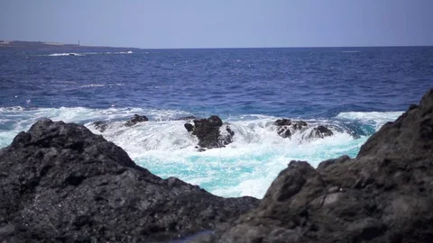 Sea waves beating against the stone beach Video stock 71402046