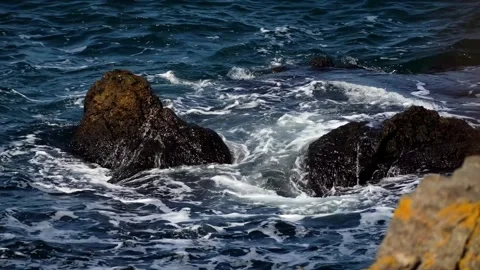 Sea waves beating from picturesque rocks and stones near the Bulgarian shore  Stock Footage 153231947