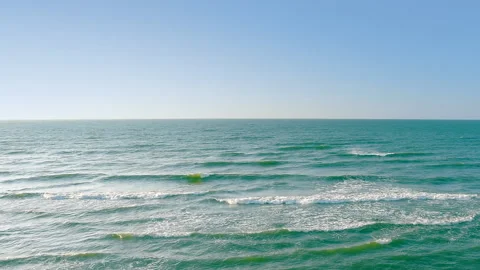 Sea waves on the blue sky background, real time, hd. ProRes 422 HQ. Stock Footage 237698207
