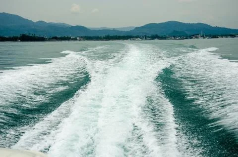 Sea waves boat Stock Photos