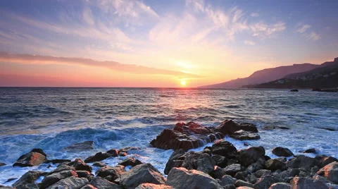 Sea waves break about big stones near the seashore Stock Footage 45964489