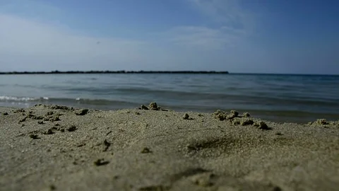 Sea waves break on beach Stock Footage 74069381