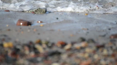 Sea waves break on pebble beach Stock Footage 47139426