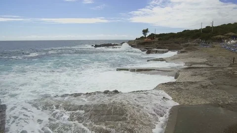Sea waves break on the stone pier Stock Footage 84222525