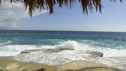 Sea waves break on the stone pier Stock Footage 84300628