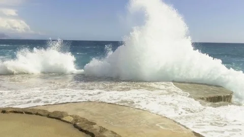 Sea waves break on the stone pier. Slow motion Stock Footage 84392461
