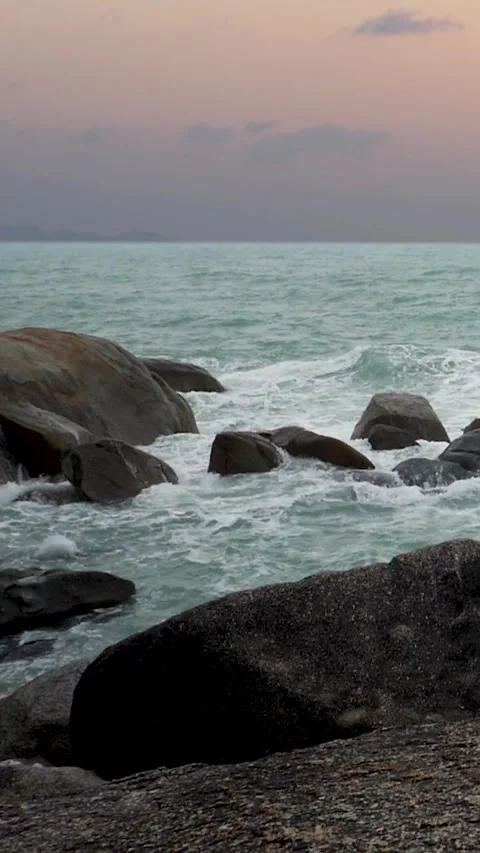Sea waves breaking against cliff Stock Footage 288835324