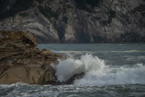 Sea waves breaking in the coast cliffs in Barrika Stock Photos