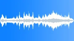 Sea waves breaking gently onto rocksSound Effect
