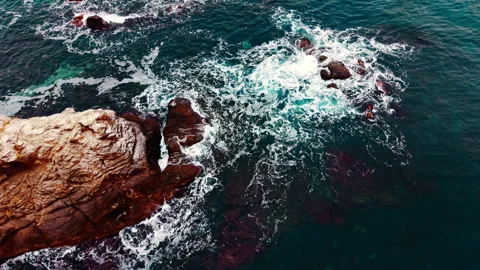 Sea waves breaking over dark coastal rocks, Black Sea coast Video stock 336340204