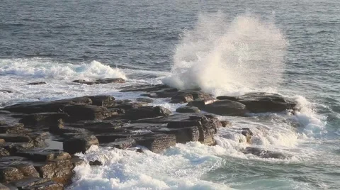 Sea waves breaking on the rocks Stock Footage 57640483