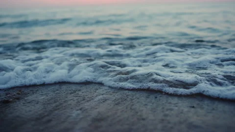 Sea waves breaking sand beach on evening seashore sunset dawn. Nature relax Stock Footage 162335707