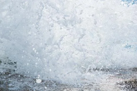 The sea waves breaking on a stone Stock Photos