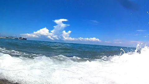 Sea, waves, bubbles, foam, sky, clouds Stock Footage 341274829