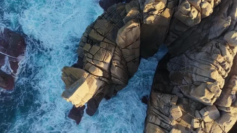 Sea Waves On Cantís de Papel Granite Rocks At Sunset Stock Footage 326884490