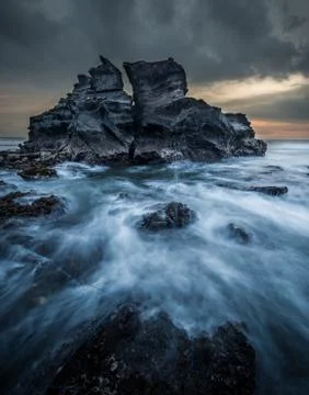 Sea waves cliff rock dramatic color 스톡 사진