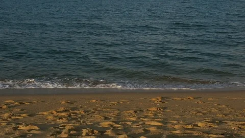Sea waves close-up at the beach in the evening Stock Footage 106465833