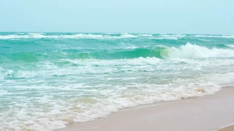 Sea waves on the cloudy sky background, horizon scene by the coast of beach. Stock Footage 241334951