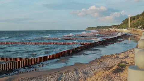 Sea waves on the coast with wave breakers 動画素材 140137529