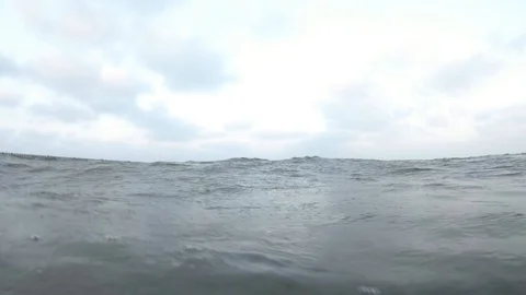 Sea waves coming over camera, underwater POV Stock Footage 109587880
