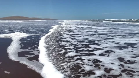 Sea waves coming to the seacoast of the empty beach. Stock Footage 248073391