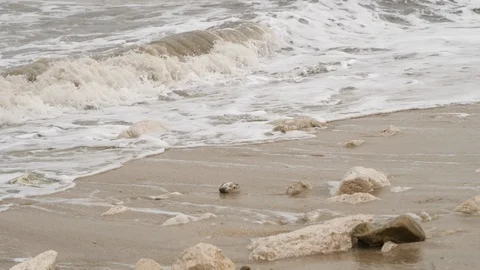 Sea waves crash on the coast Stock Footage 86190761