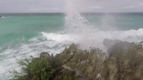 Sea Waves crash on Rocks, Bantigue beach, Malapascua island, Philippines Stock Footage 246778477