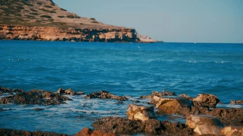 Sea Waves Crash on the Rocks Stock Footage 124588403