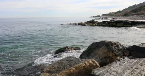 Sea waves crash on the rocks. Stock Footage 228794582