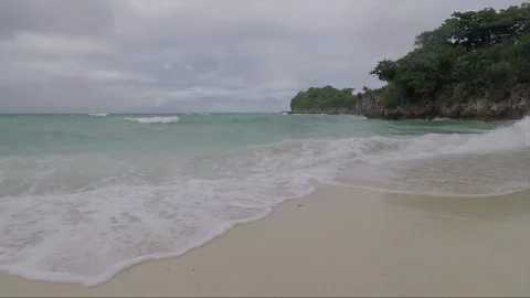 Sea Waves crash on sandy beach, Malapascua island, Philippines Stock Footage 246594018