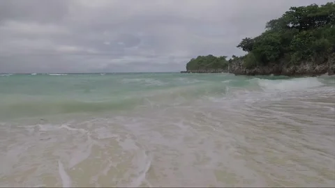Sea Waves crash on sandy beach, Malapascua island, Philippines Stock Footage 246594485