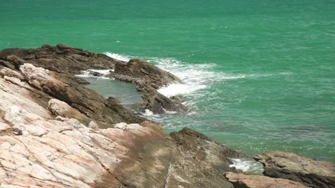 The sea waves crashed into the rocks Stock Footage 193985905