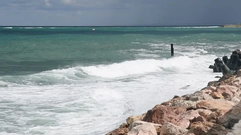 Sea waves crashes on jetty Stock Footage 192322637