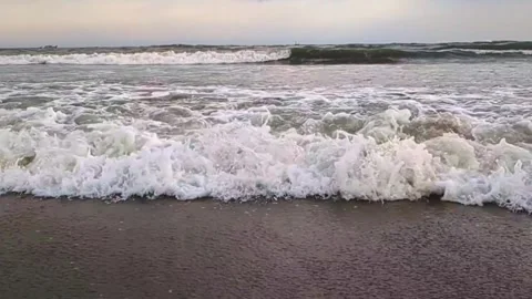 Sea Waves Crashing on Sandy Beach Shoreline Stock Footage 332629481