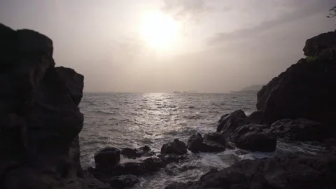 Sea Waves Crashing On Stone Beach, Cameroon, Africa Stock Footage 261029458