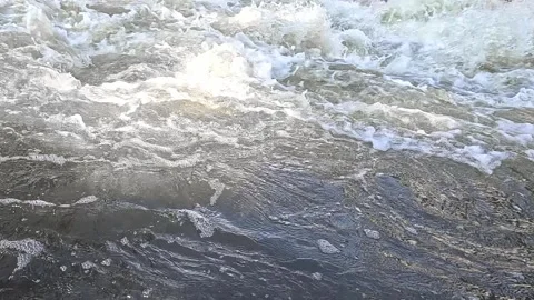 Sea waves creating white foam in dynamic motion Stock Footage 316149922