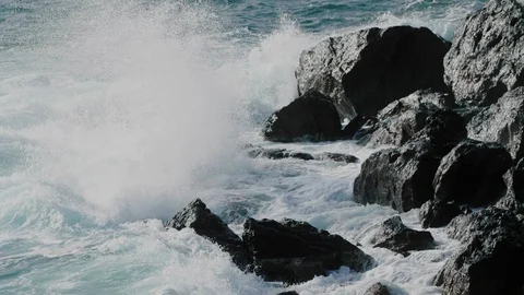 Sea waves crushing on rocks slow motion Stock Footage 101083014